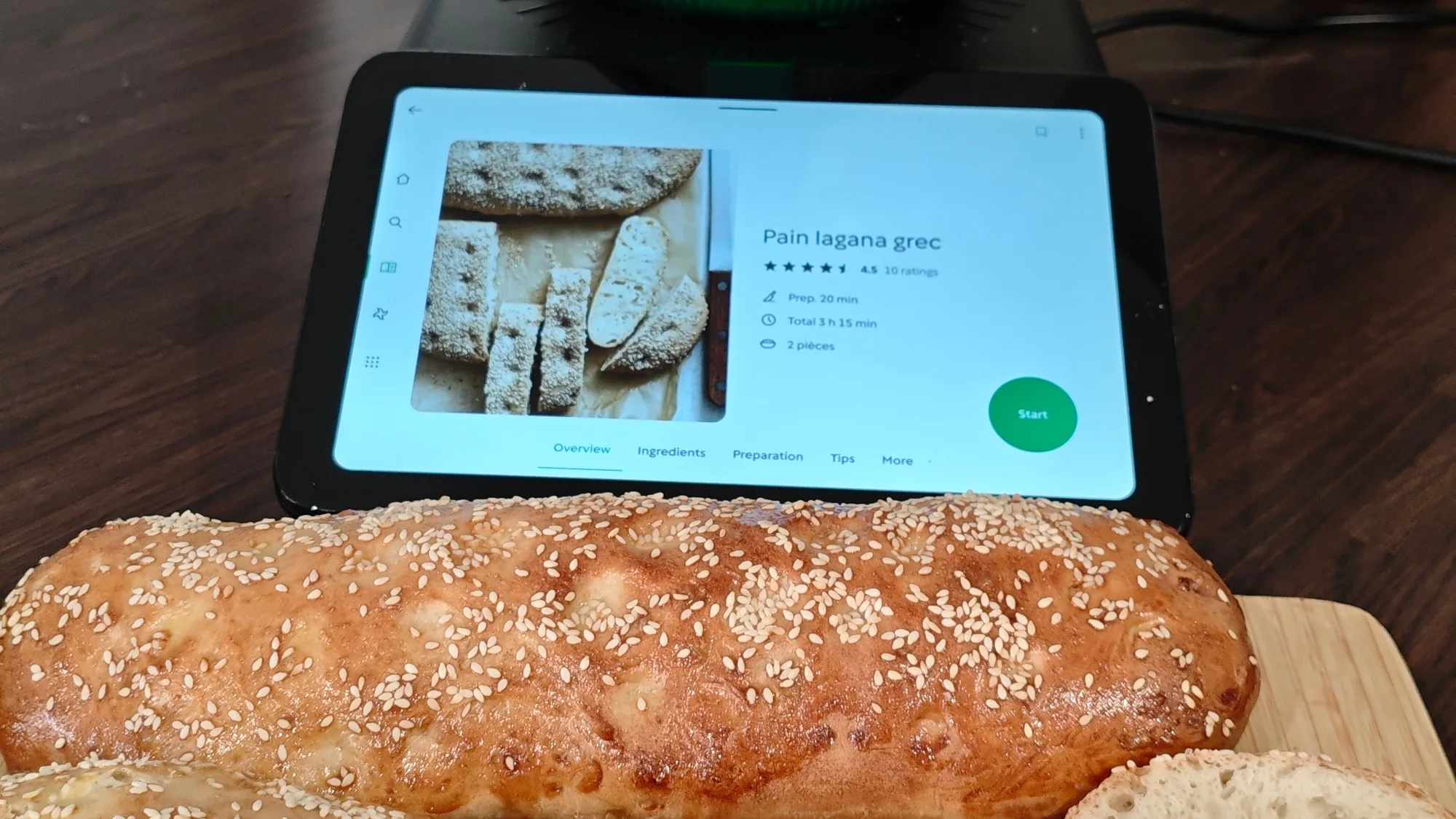 The Thermomix TM7 on a worktop with its screen lit, part-way through a recipe.